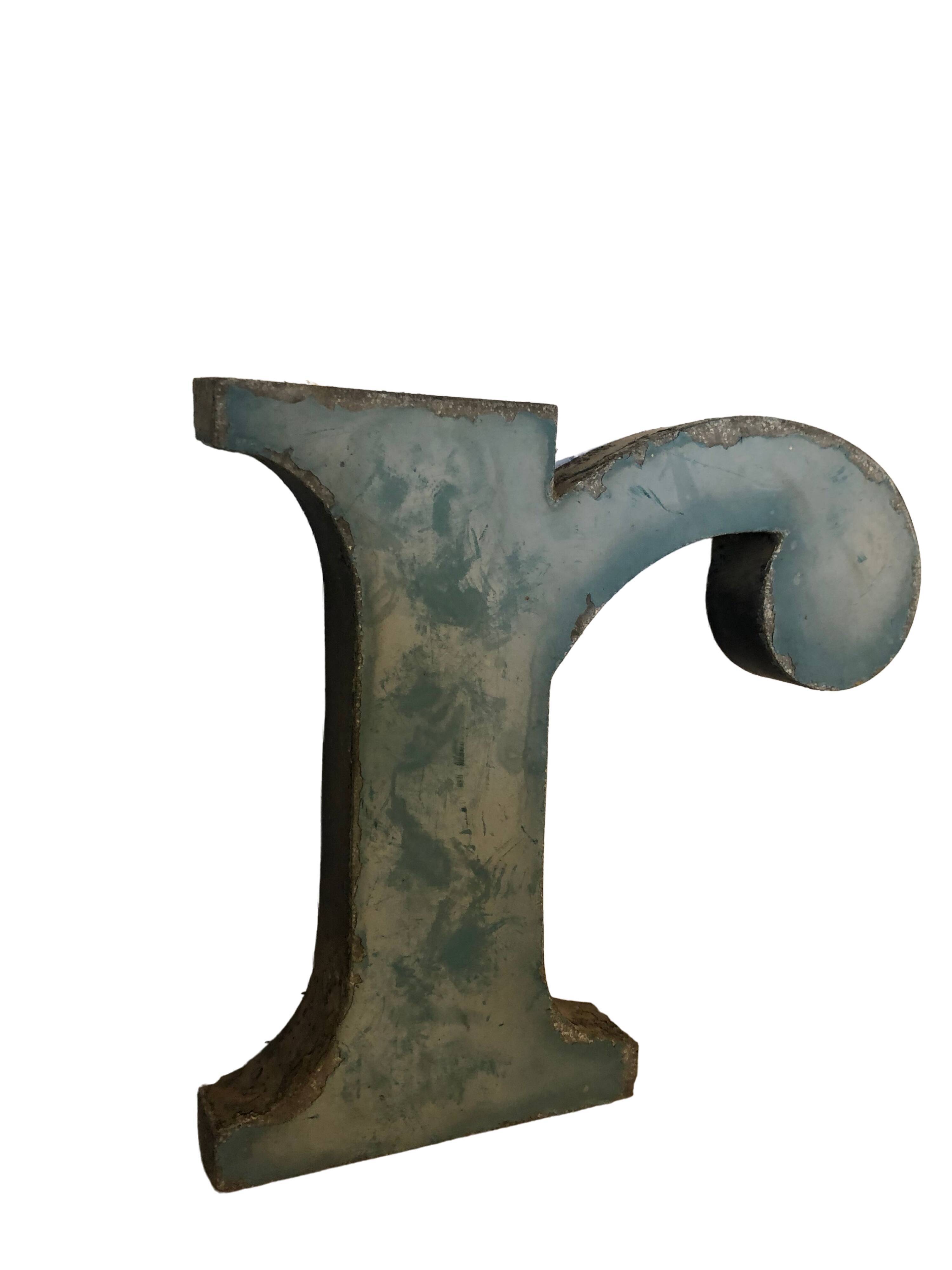 Blue sign letter "R"