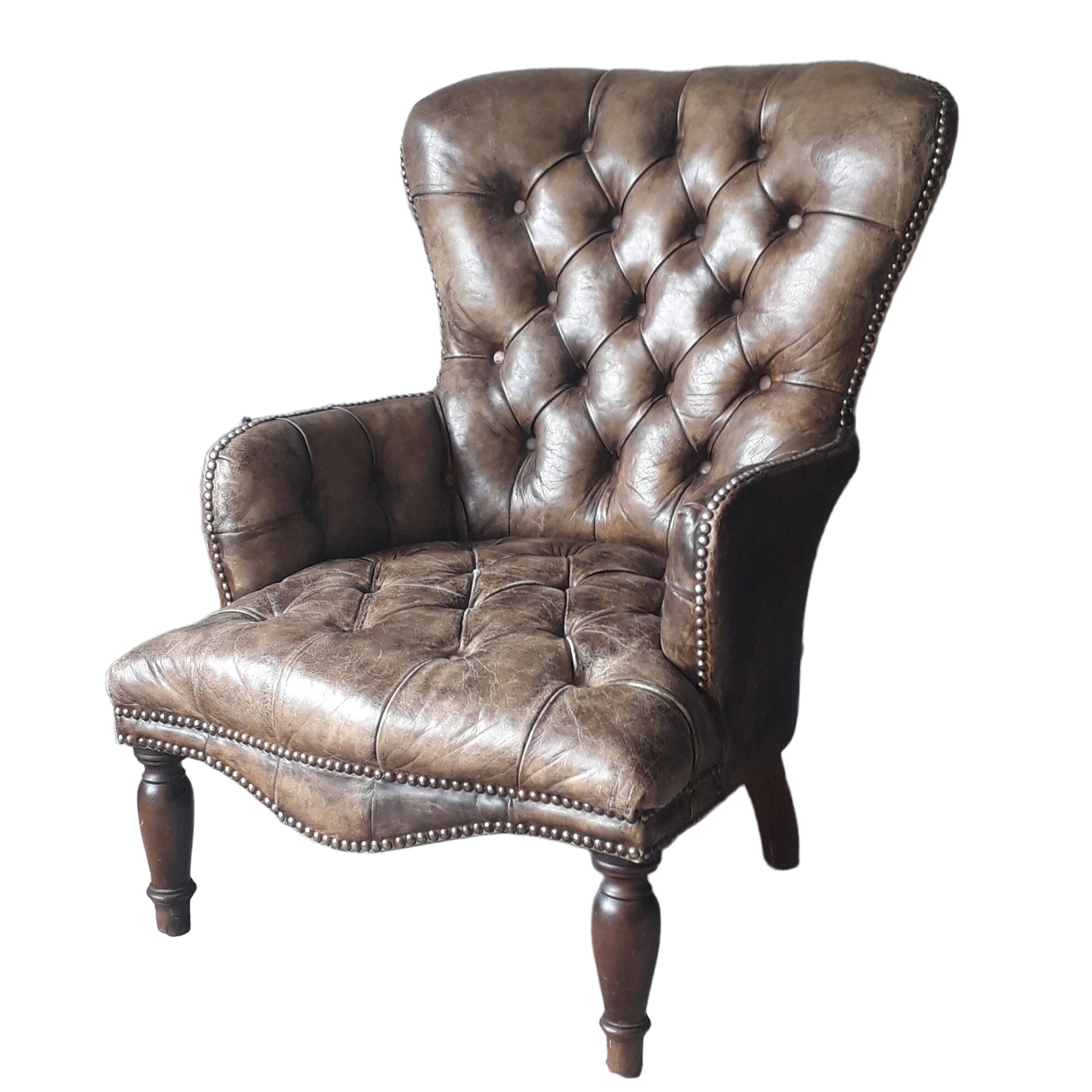Fauteuil Chesterfield antique