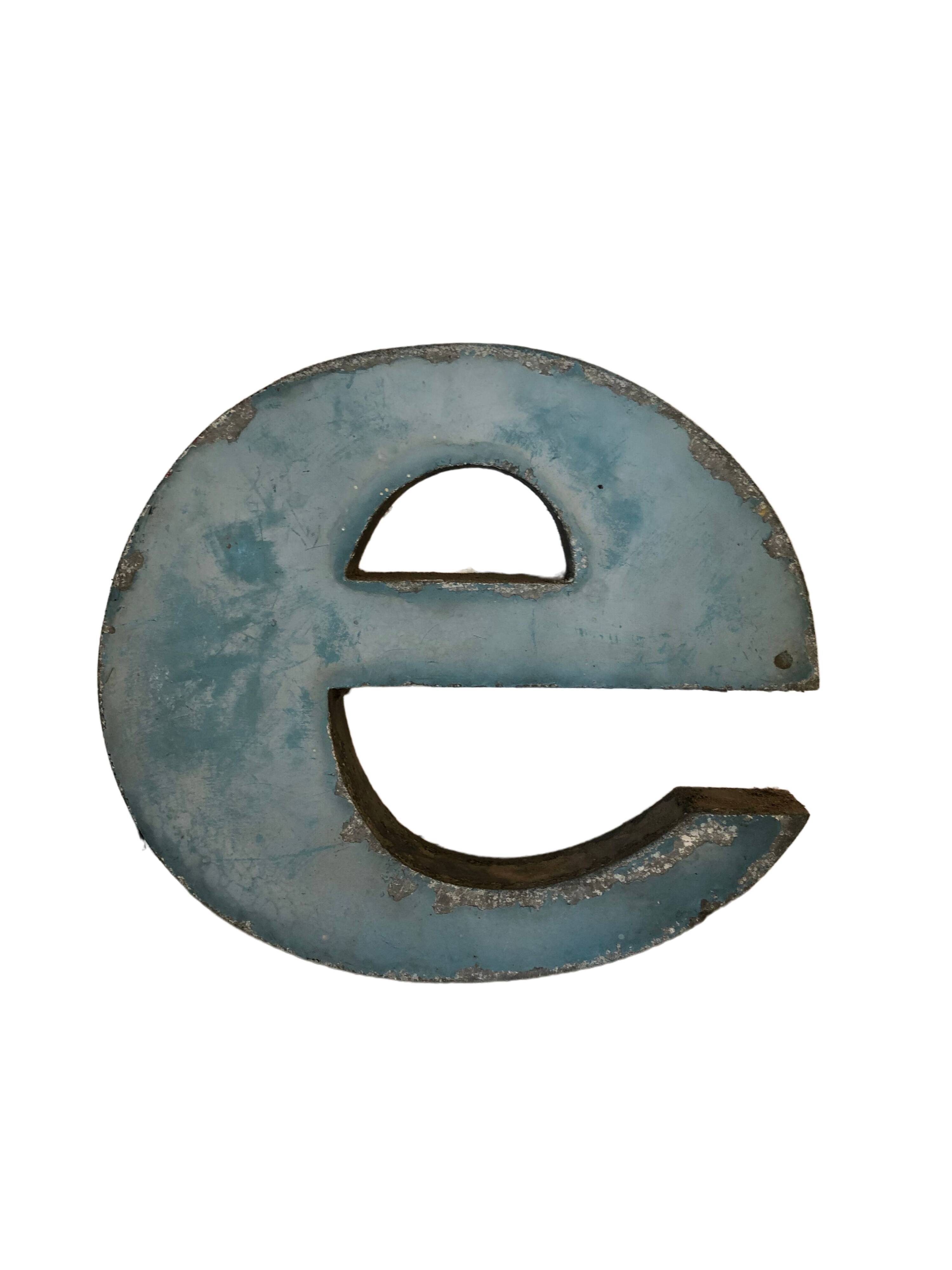 Blue sign letter "E"