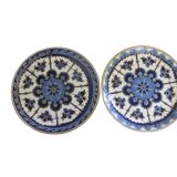 Decorative or utilitarian plates in enamelled earthenware