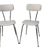 Duo of chairs in skaï, 60-70s