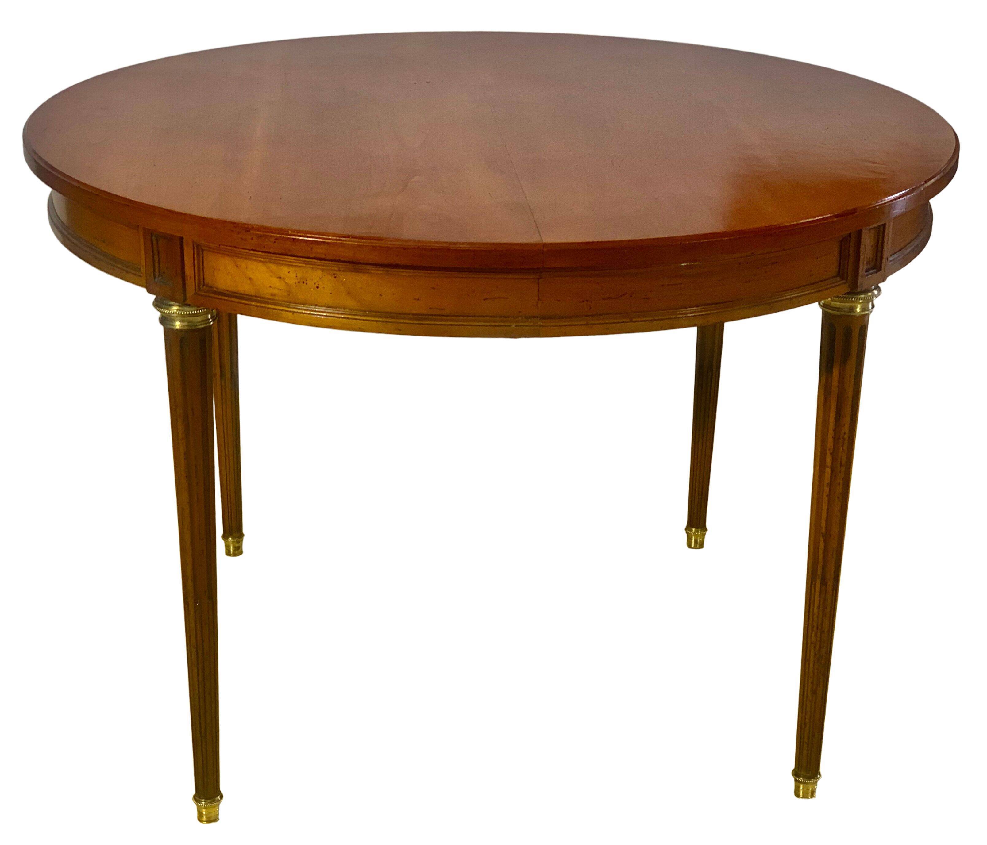 Louis XVI style table in cherry with 2 extensions