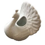 White peacock vase