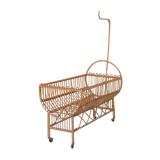 Vintage rattan crib, casters and matte for bed sky