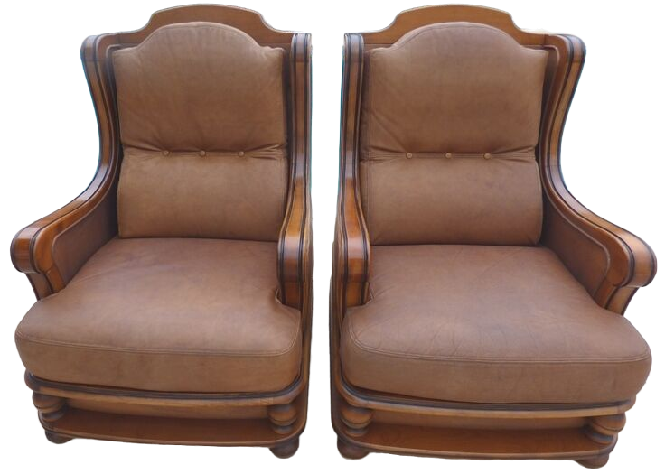 Pair of aged leather armchairs with seat and firm backrest with cherry wood frame