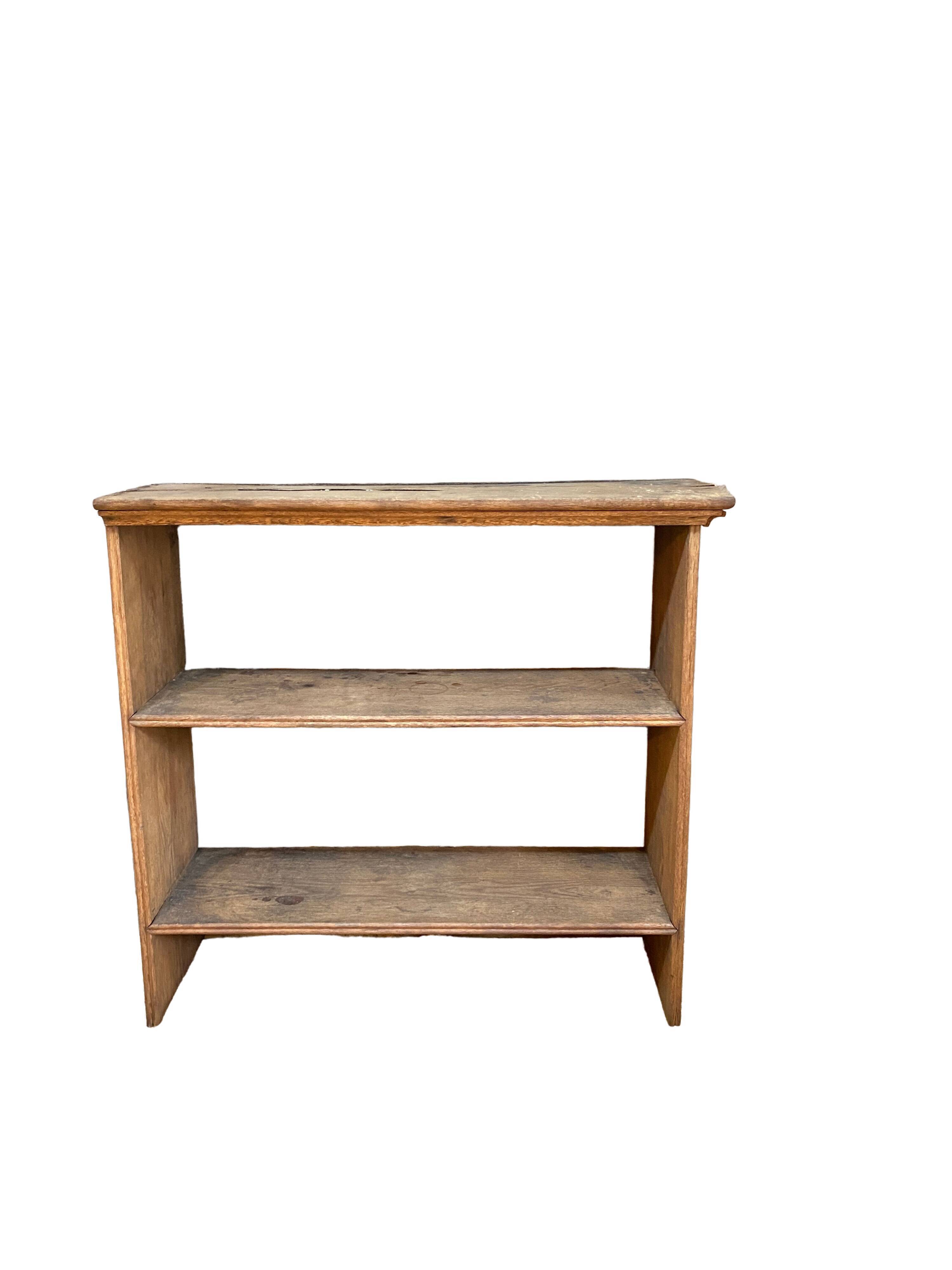 Antique shelf in raw wood