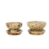 Pair of vergy speckled sandstone candle holders, vintage