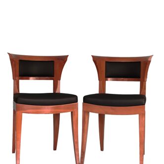 Pair of cherry wood dining chairs by Leon Krier, 1991