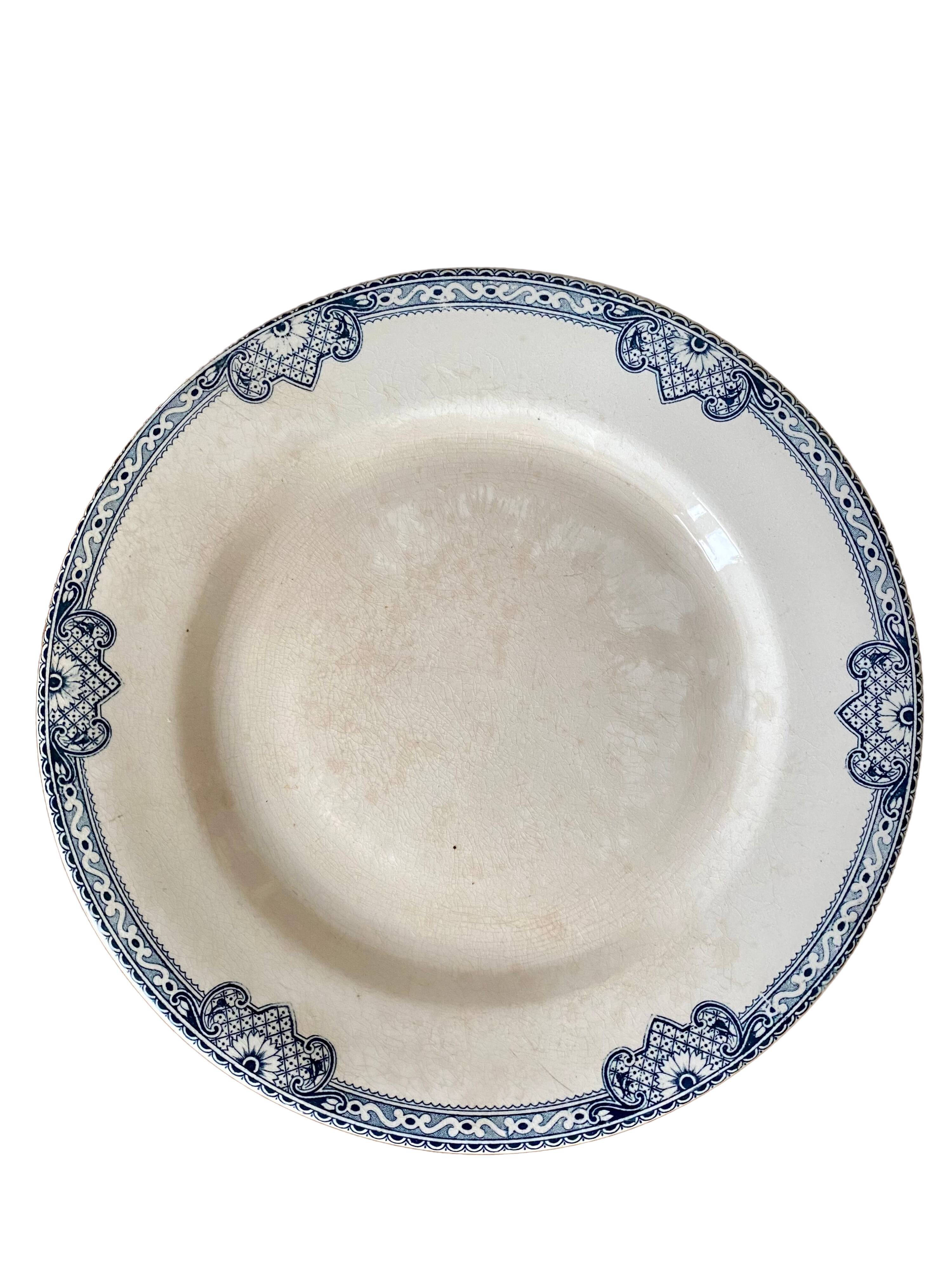 Old plate on iron earth in Salins earthenware