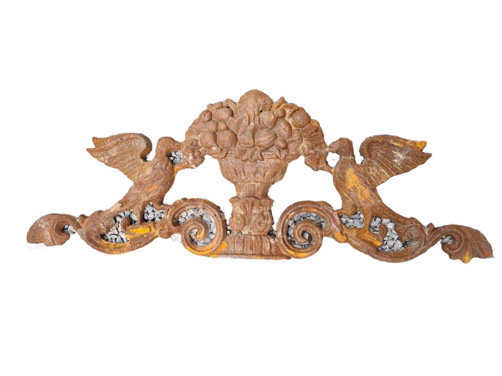 Cast iron pediment with birds