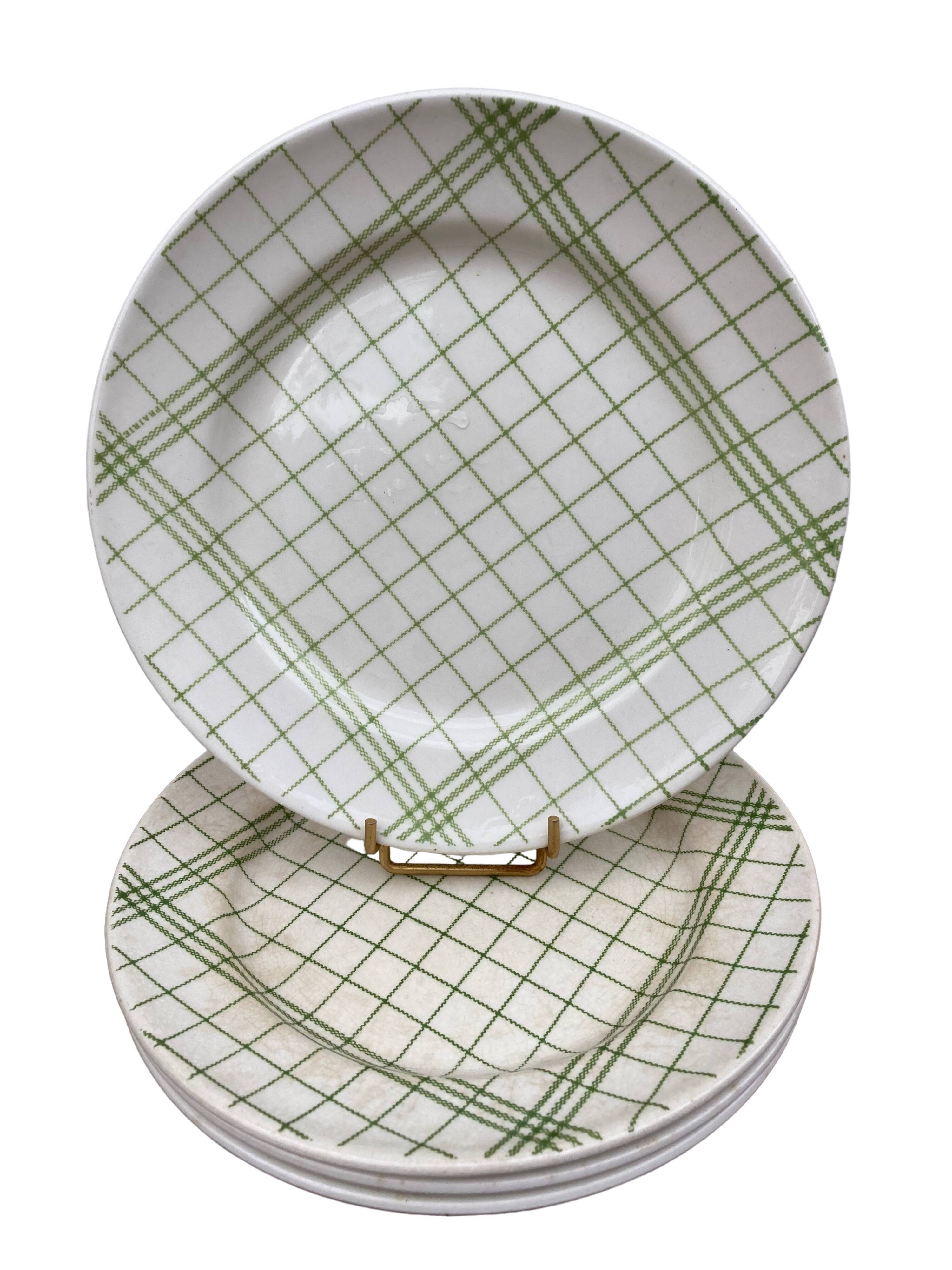 4 flat plates Gien tea towel pattern