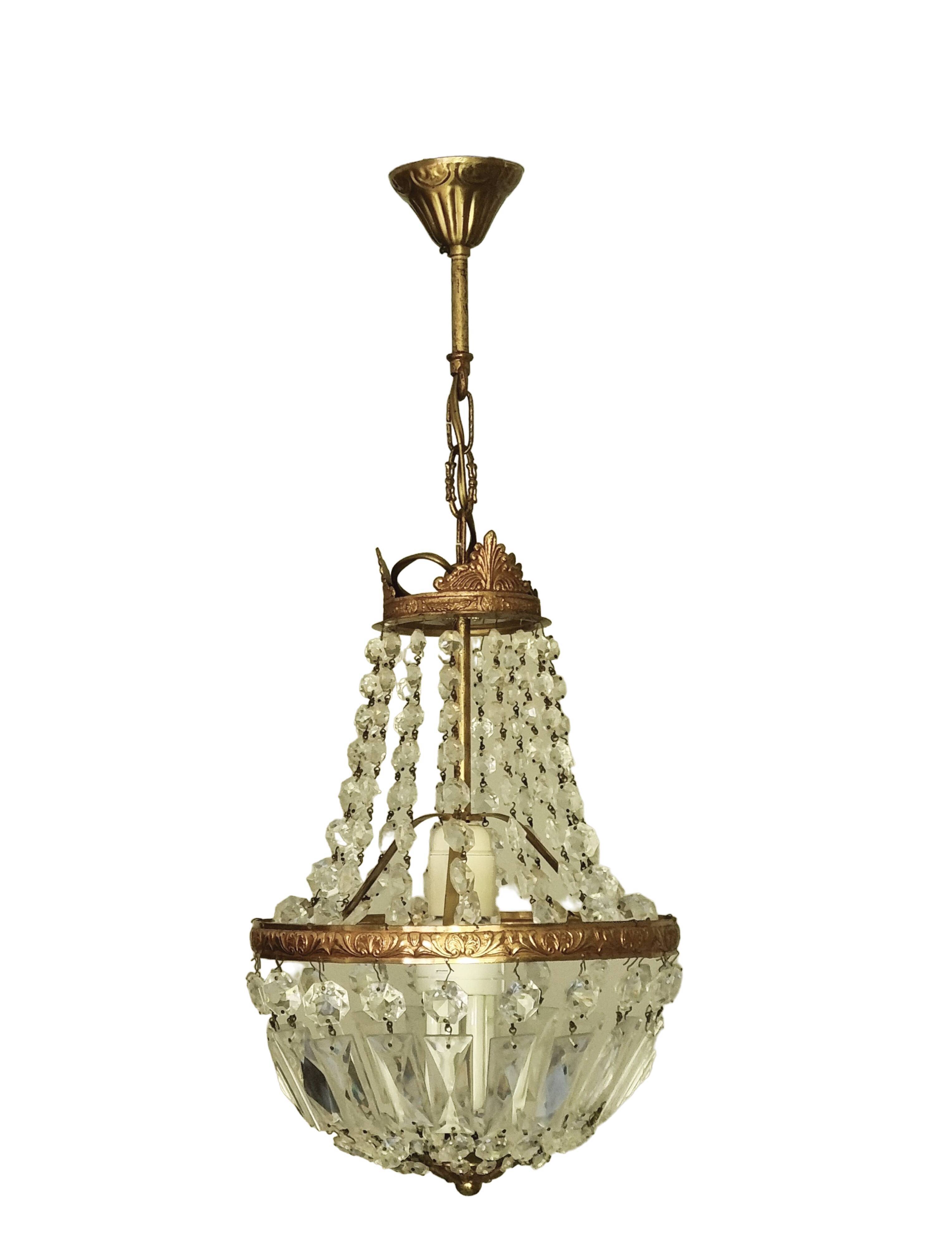 Brass chandelier and grapevine glass
