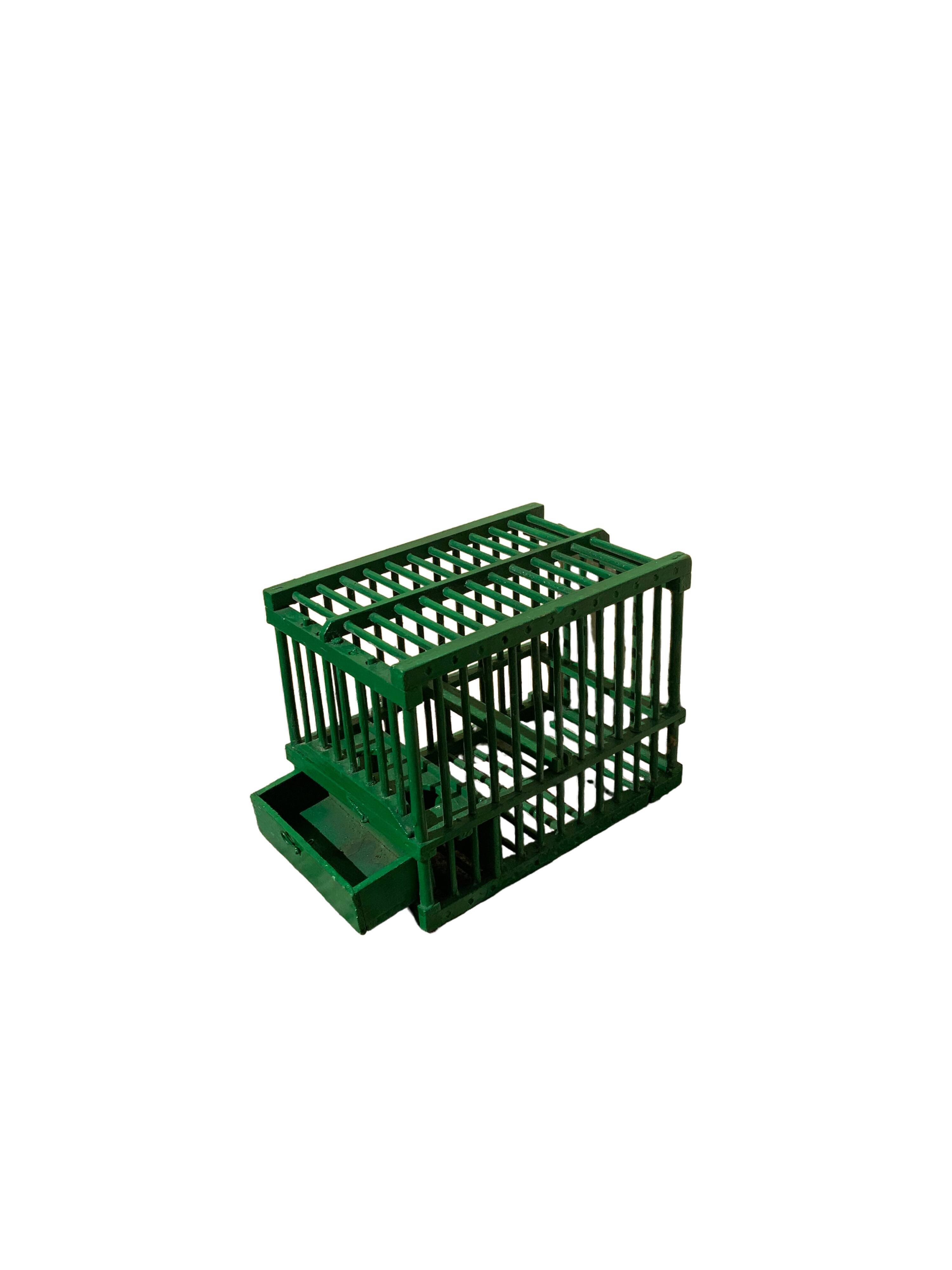 Old bird cage in green wood vintage decoration