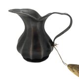 Tin pitcher