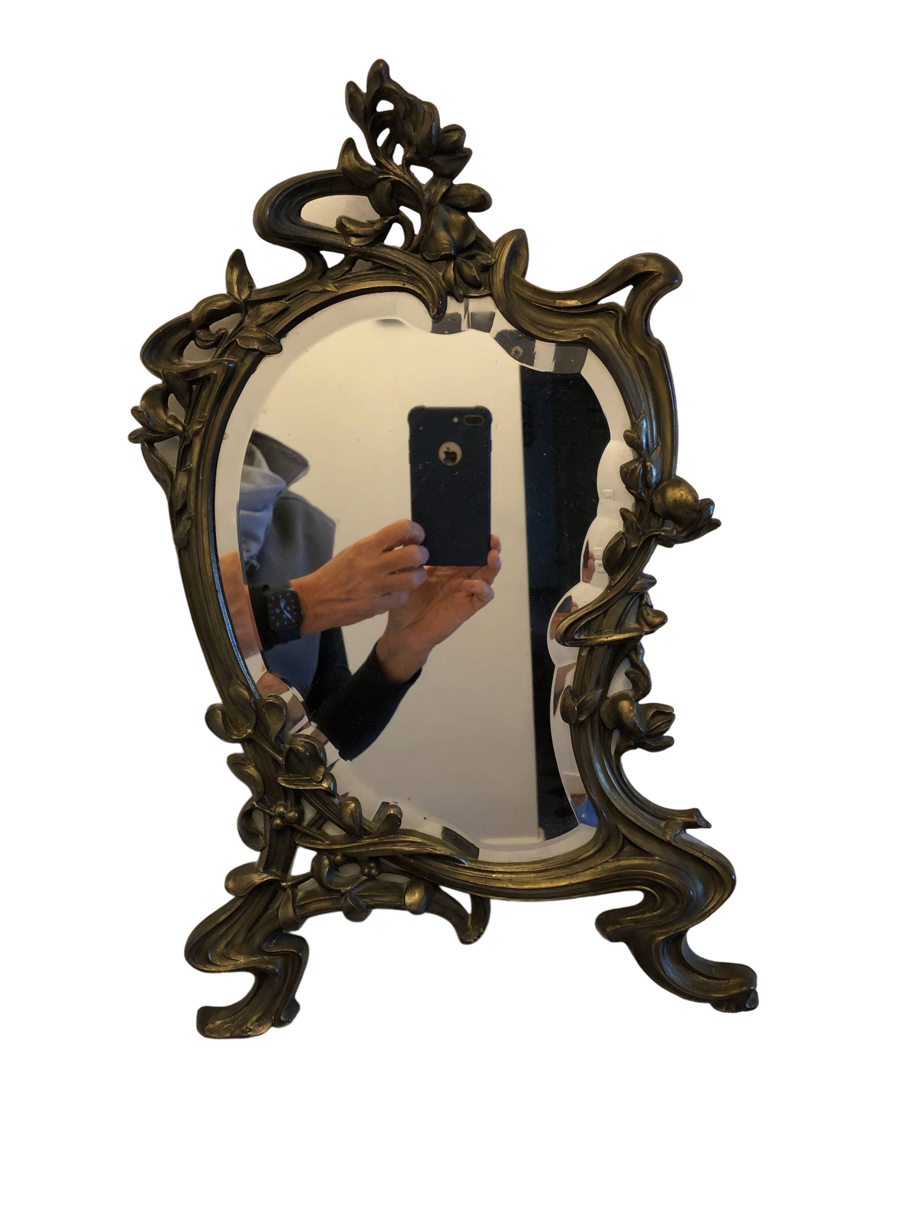 Mirror in gilded bronze and beveled glass 30x48cm