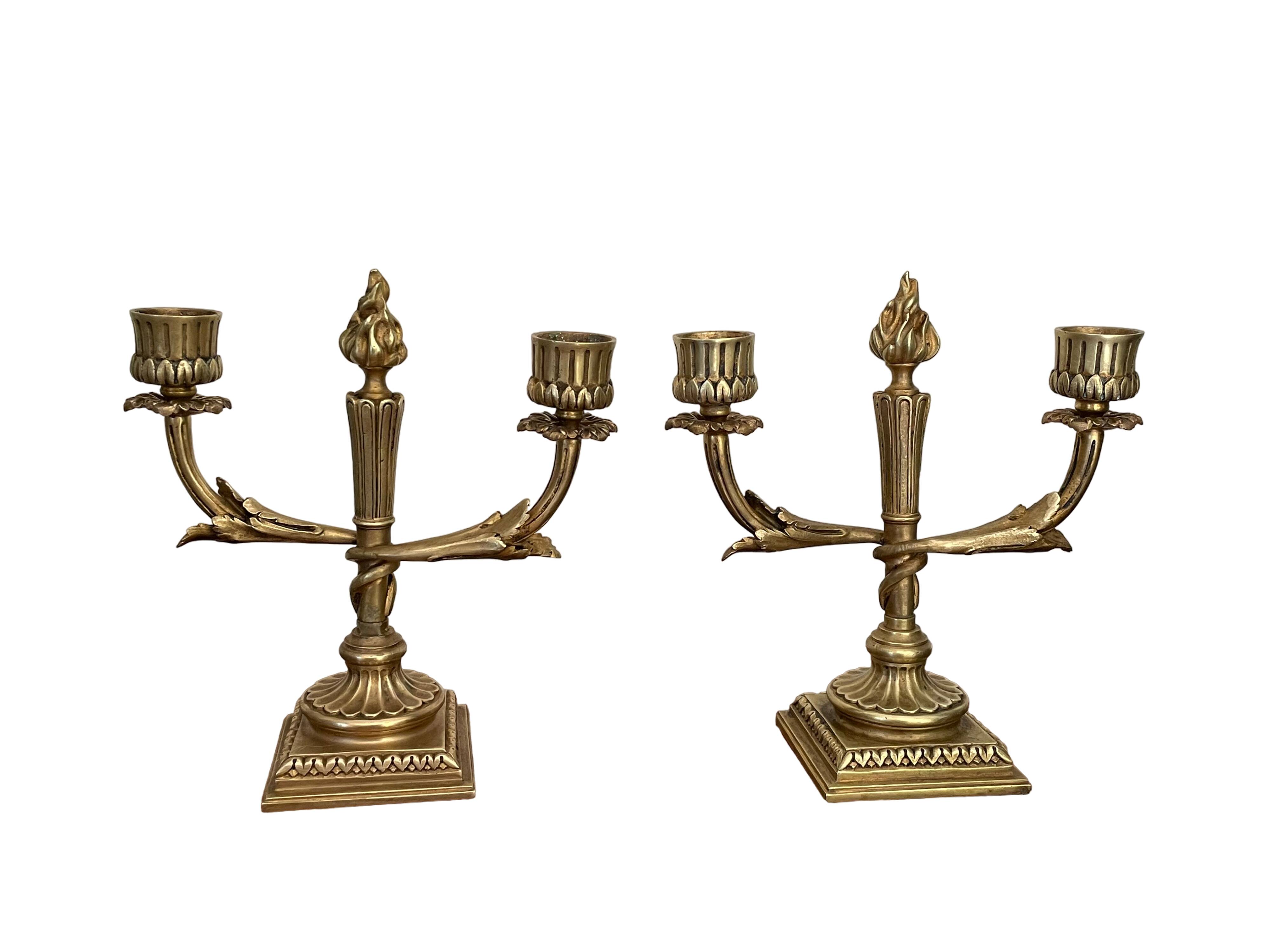 Pair of candle holders in gilded bronze nineteenth century