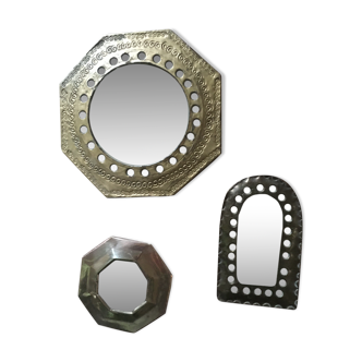 Ethnic brass mirrors.