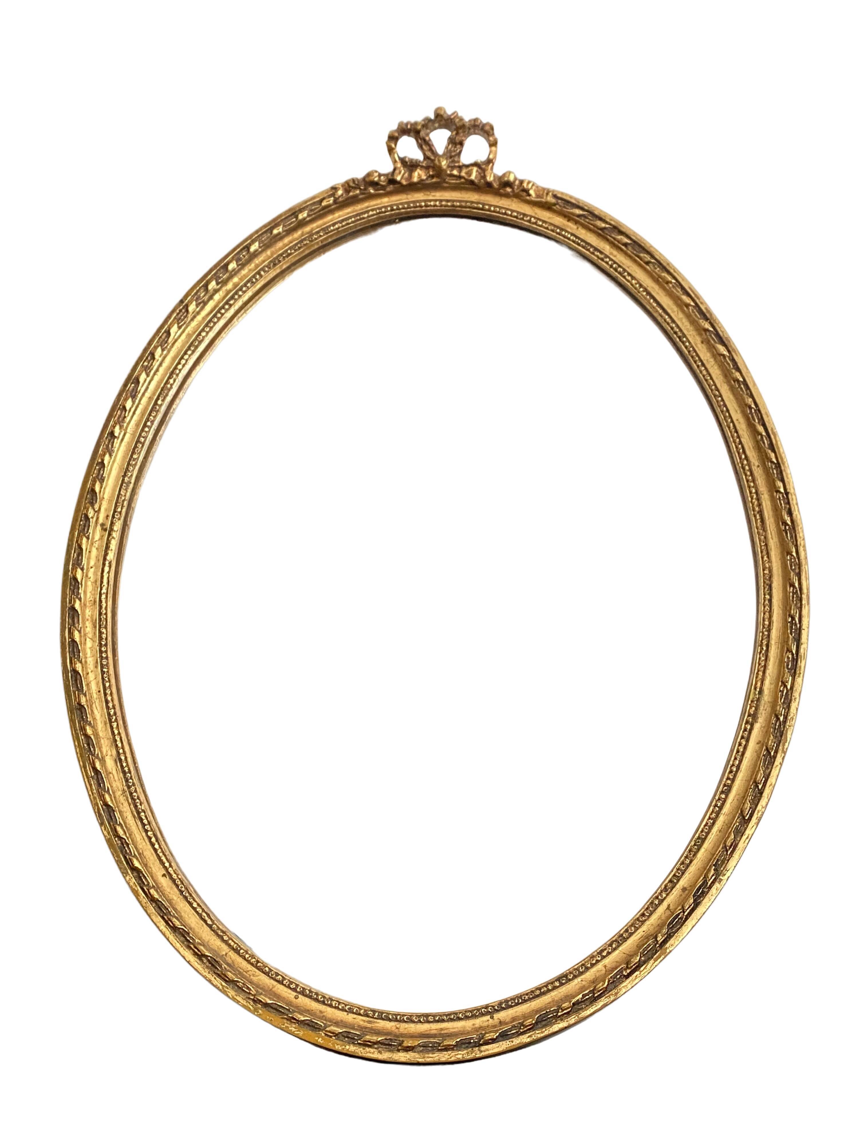 Golden oval mirror 32x44cm