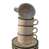 Four cups and their saucers