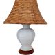 Ceramic lamp with rattan lampshade.
