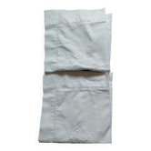 2 housses de coussins blanches brodées de chez Nimbus