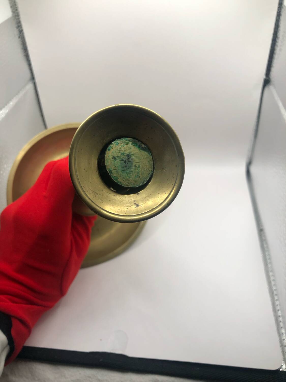 Candle holder with a pusher