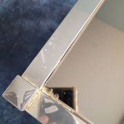 Nesting tables in gold/chrome metal and amber mirror