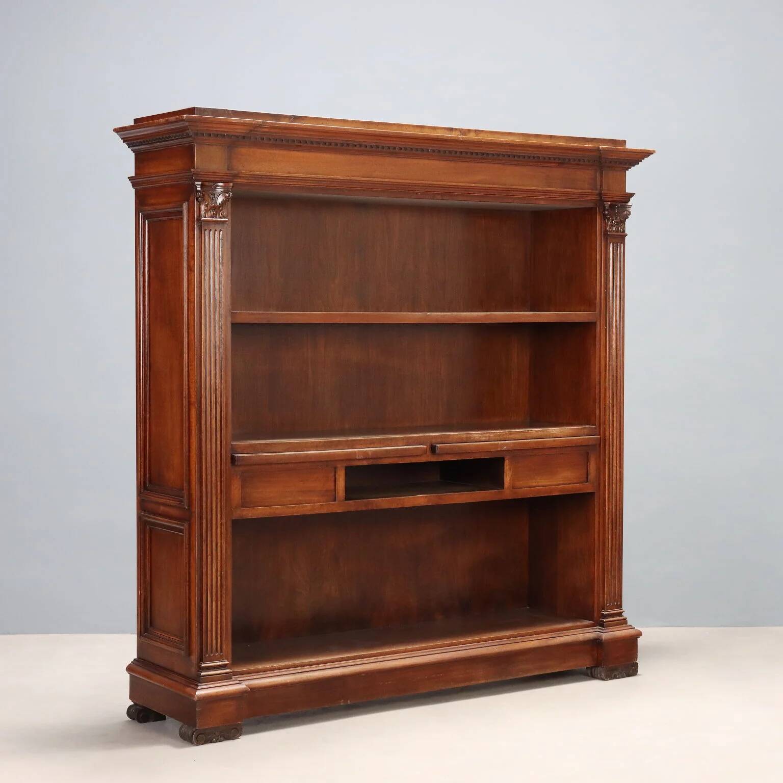 Antique walnut library with Corinthian decorations, 20th century.