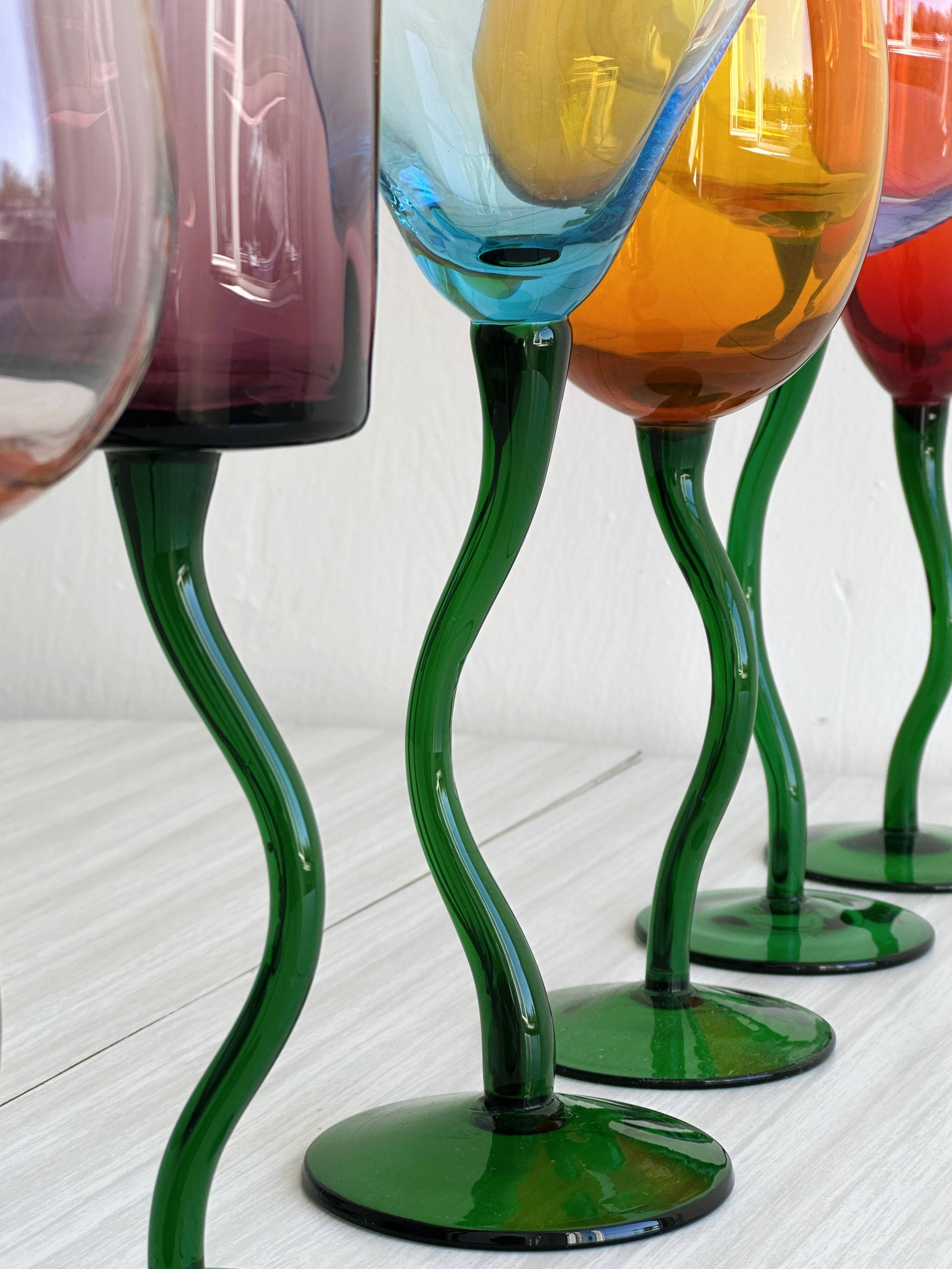 6 colored glasses with twisted feet