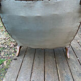 Louis XV style armchair/bergère from the early 20th century.