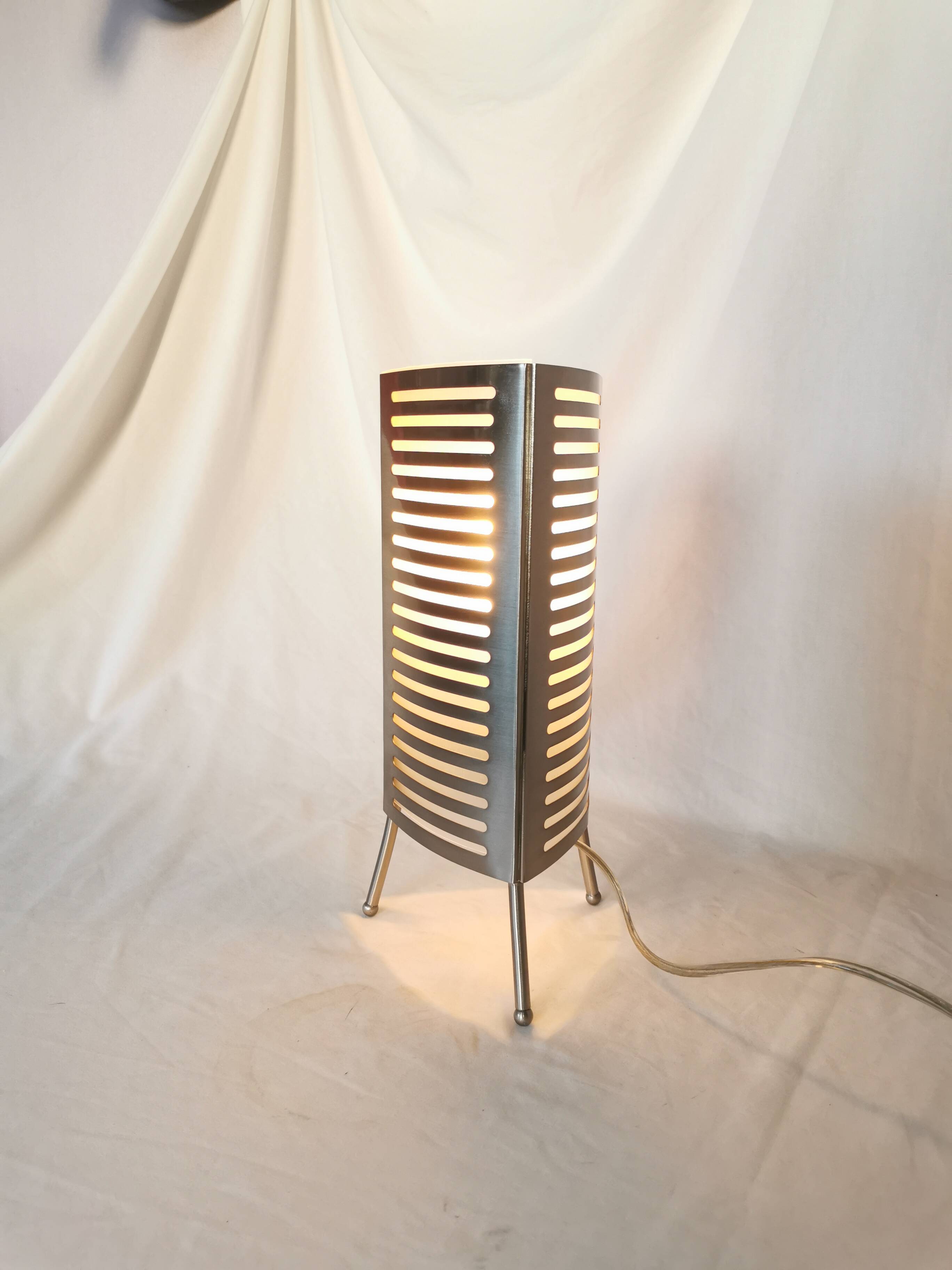 Openwork stainless steel table lamp, Sweden, 1990