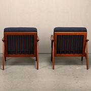 Pair Scandinavian Modern armchairs in teak and dark blue bouclé fabric