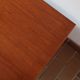 Small piece of furniture with 2 drawers in teak, bedside table or end table.