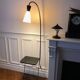 Tablet floor lamp and magazine holder with diabolo