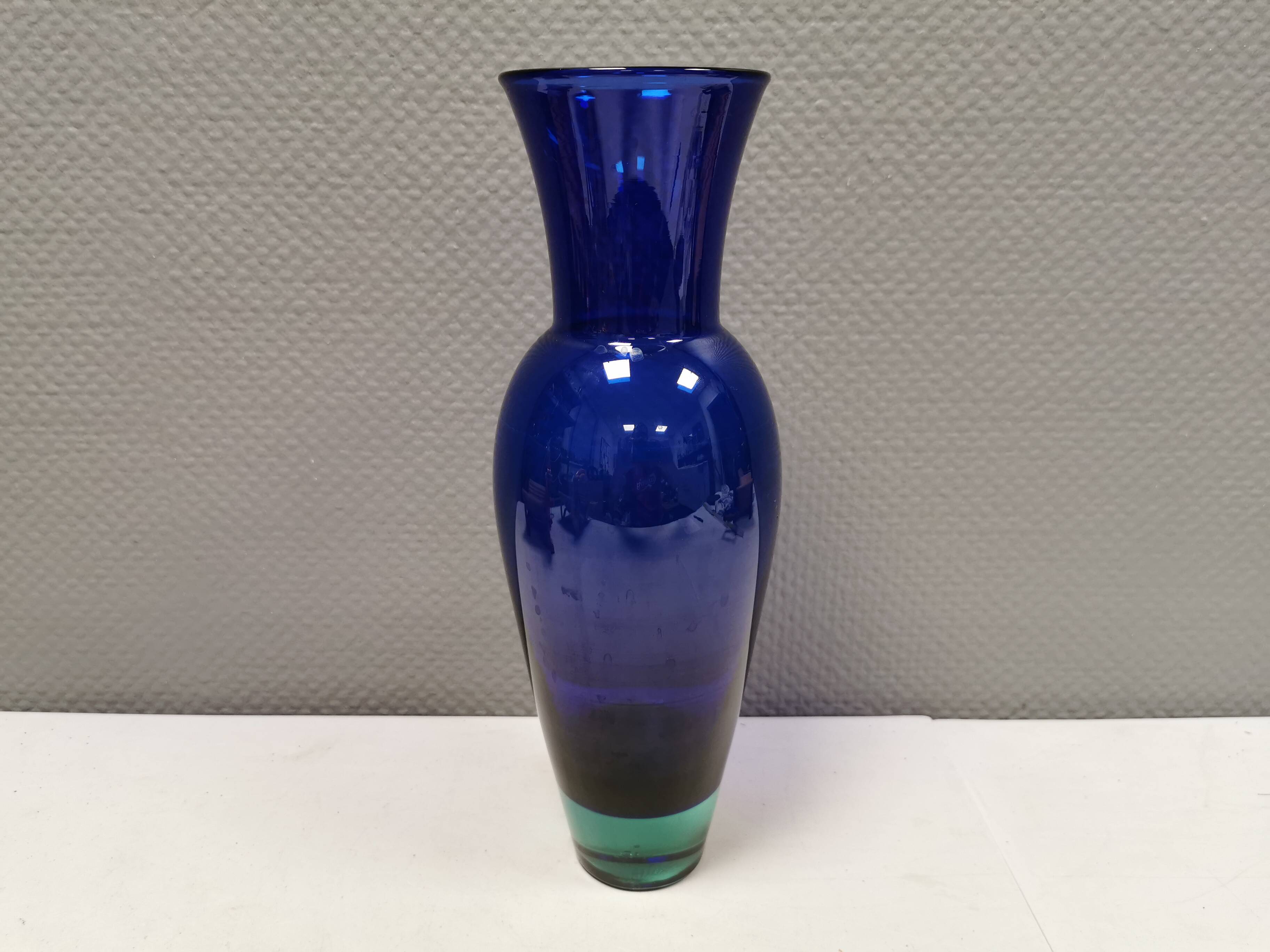 Holmegaard Harlequin Glass vase in blue with thick green base. Designed by Anja Kjær in 1994.
