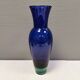 Holmegaard Harlequin Glass vase in blue with thick green base. Designed by Anja Kjær in 1994.
