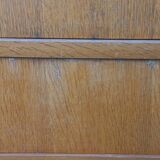 Vintage oak commode with tapered legs and wings from the 1950s.