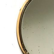 Miroir biseauté antique avec cadre en métal doré