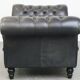Black chesterfield daybed made of cowhide