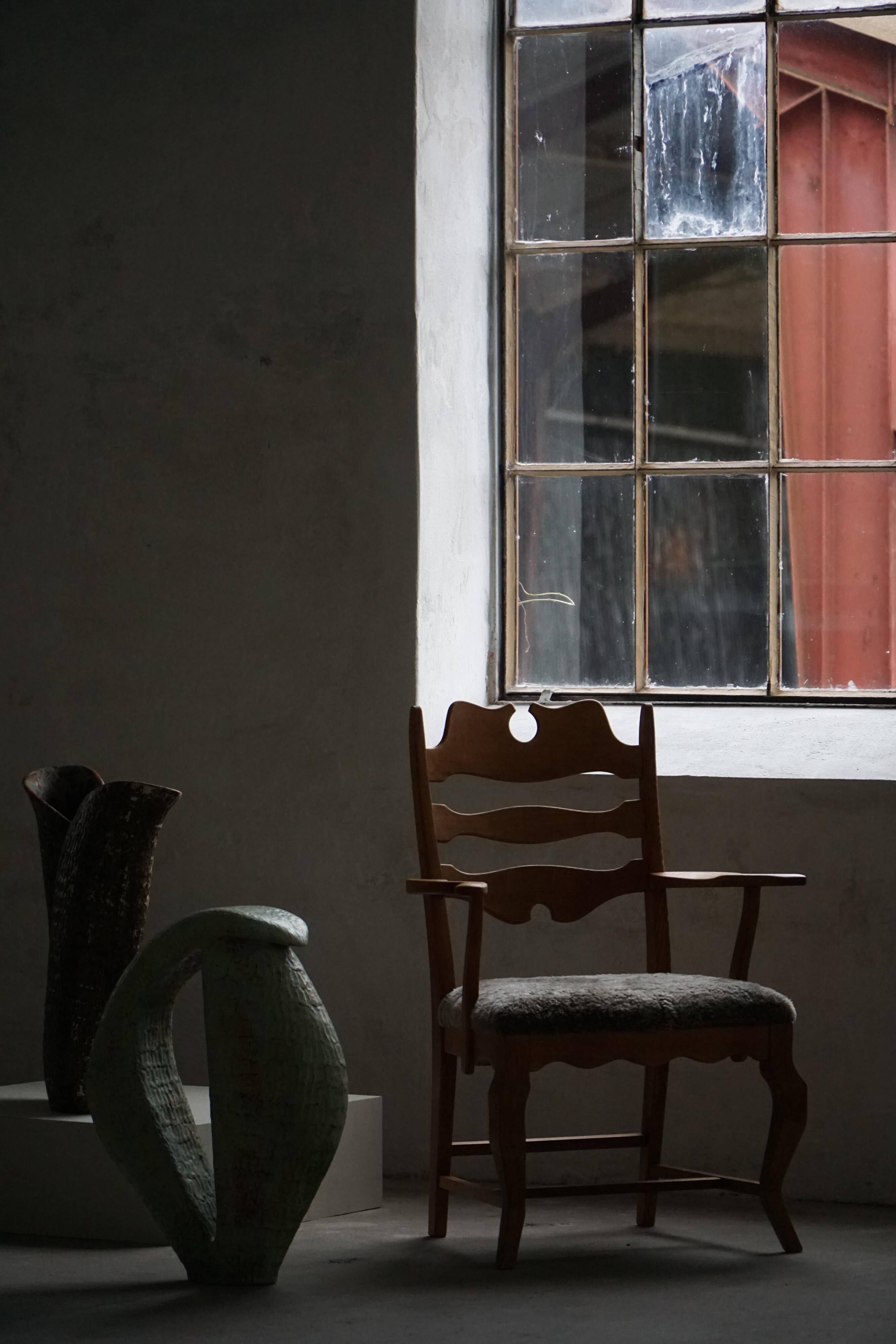Razorblade armchair from the mid-20th century by Henning Kjærnulf, oak and lambswool, 1960.