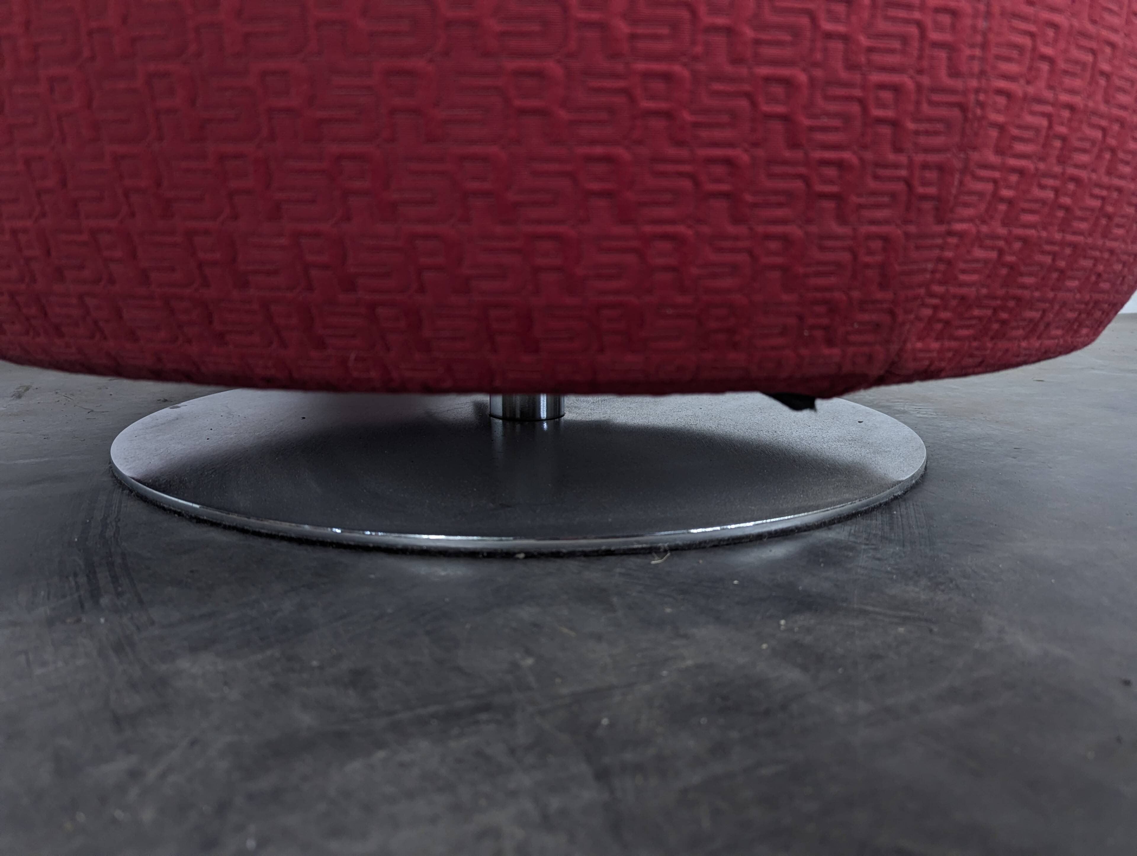 Roche Bobois swivel chair in red fabric with 2000s patterns.