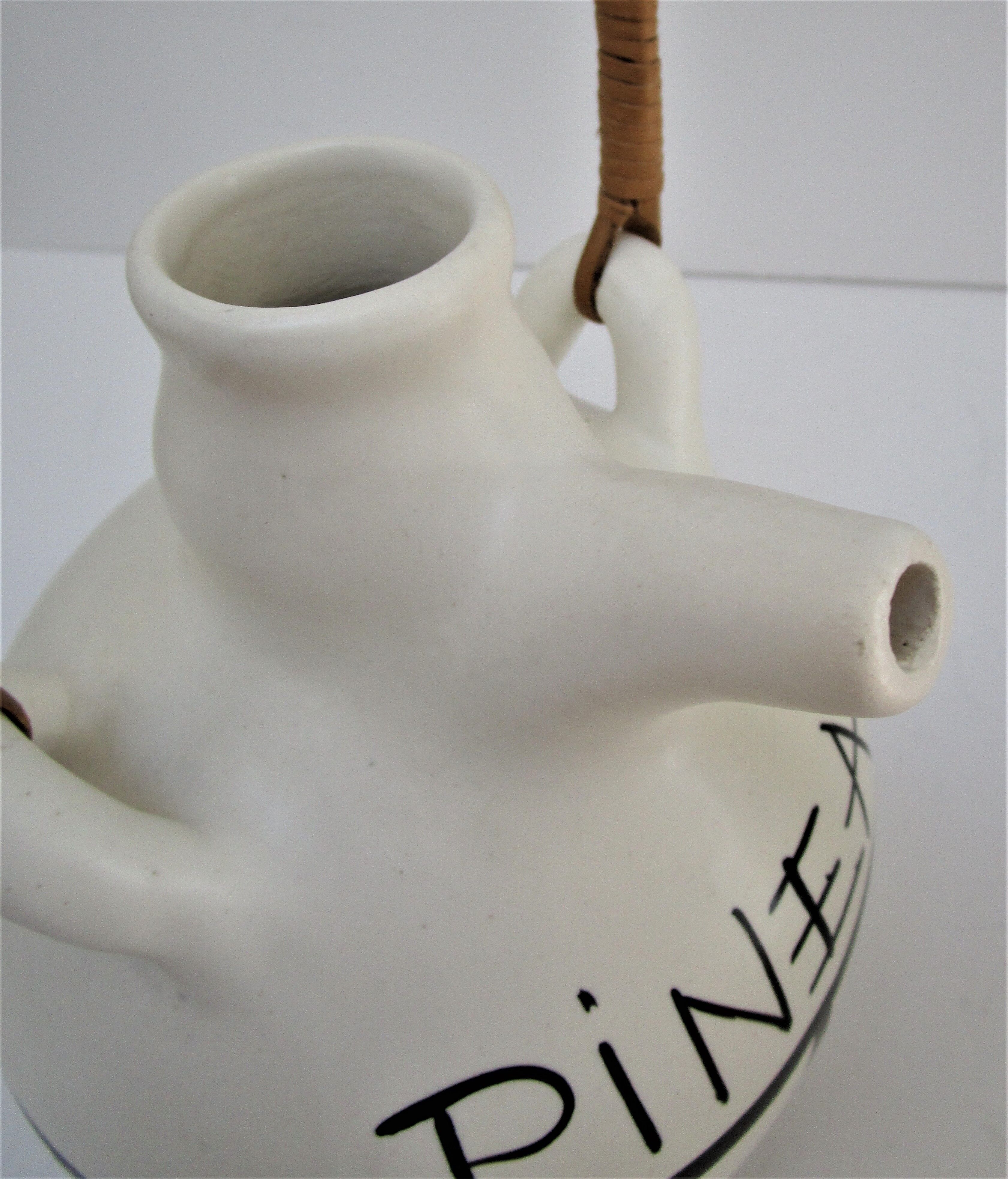 pineau bottle and ceramic cup by Lili Voltz 60s