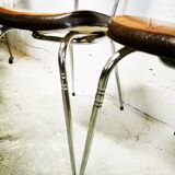 Pair of chrome and skai chairs
