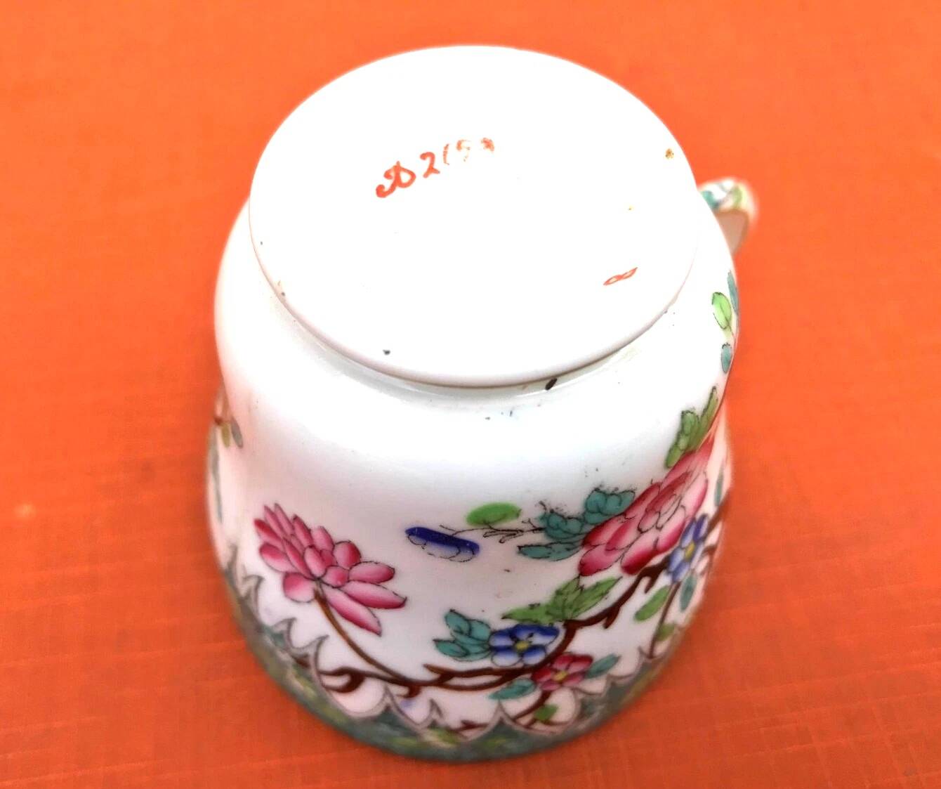 Antique porcelain cup in the Minton style with Japanese decoration.