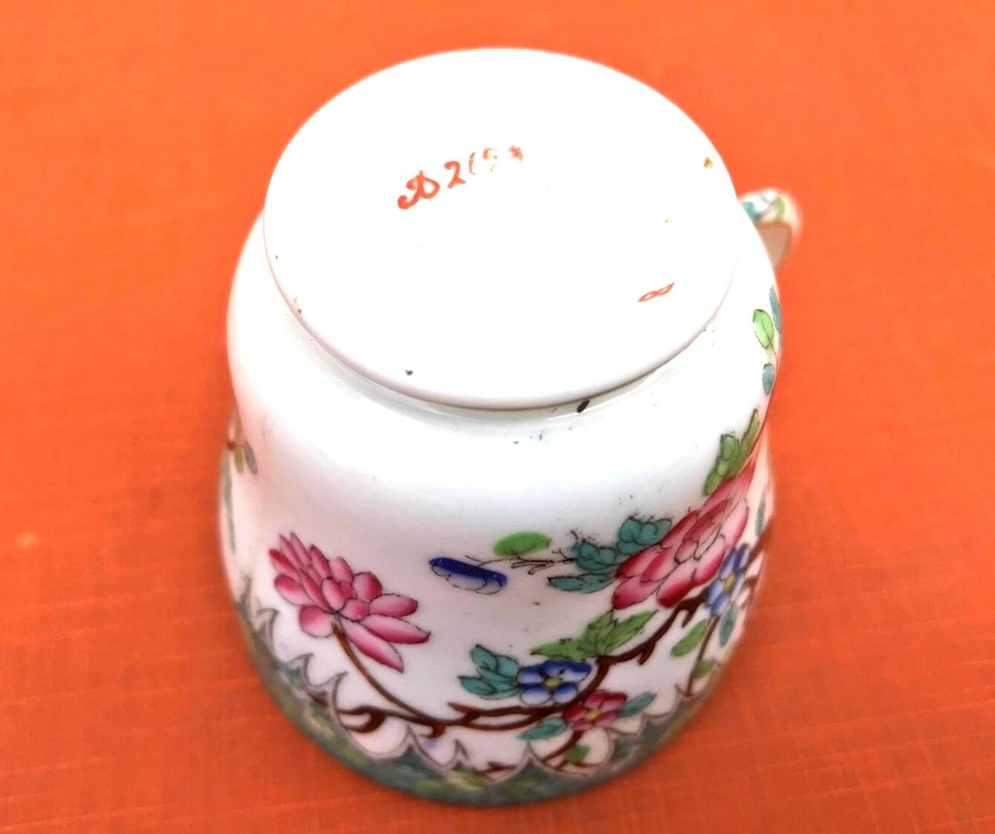 Antique porcelain cup in the Minton style with Japanese decoration.