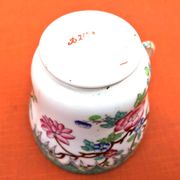 Antique porcelain cup in the Minton style with Japanese decoration.