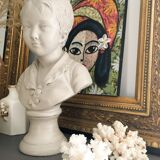 Cherub bust in platter