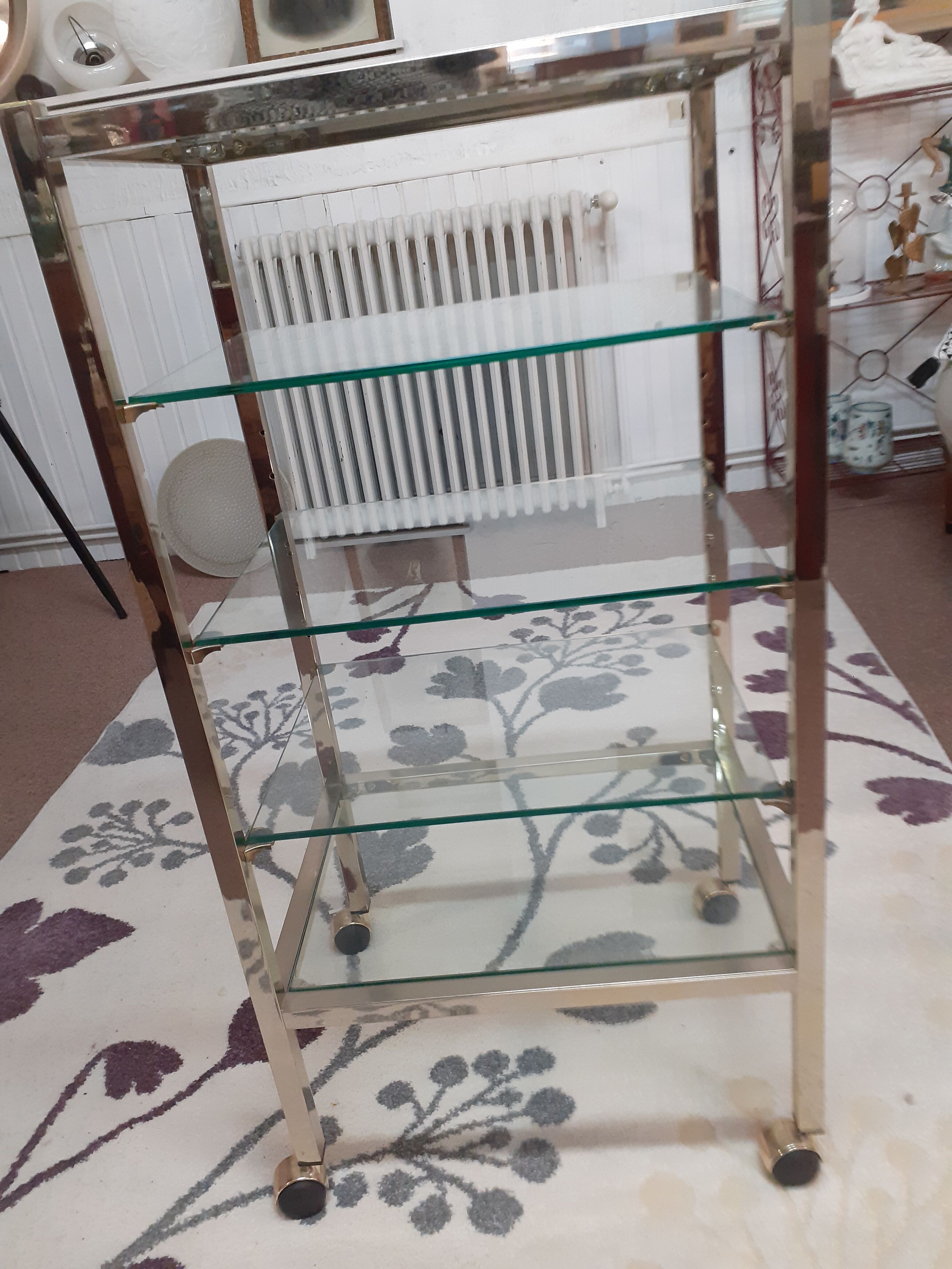 Glass and brass shelf on wheels
