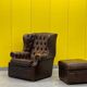 Brown leather chesterfield wing chair with Ottoman