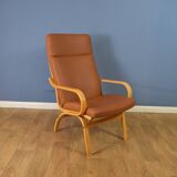 Pair of mid century retro vintage danish tan leather lounge armchair  1970s